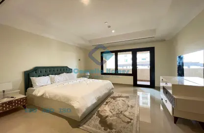 Room / Bedroom image for: Apartment - 1 Bedroom - 2 Bathrooms for sale in East Porto Drive - Porto Arabia - The Pearl Island - Doha, Image 1