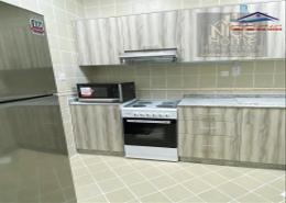 صورةمطبخ لـ: شقة - 3 غرف نوم - 3 حمامات للكراء في مدينة خليفة - الدوحة, صورة 1