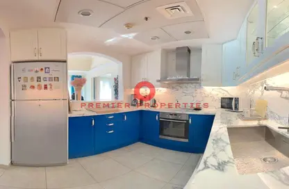 صورة لـ مطبخ شقة - غرفة نوم - 2 حمامات للايجار في طريق بورتو الغربي - بورتو أرابيا - جزيرة اللؤلؤة - الدوحة ، صورة رقم 1