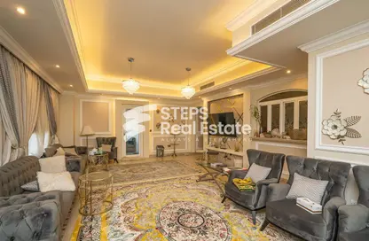 Living Room image for: Apartment - 3 Bedrooms - 4 Bathrooms for sale in West Porto Drive - Porto Arabia - The Pearl Island - Doha, Image 1