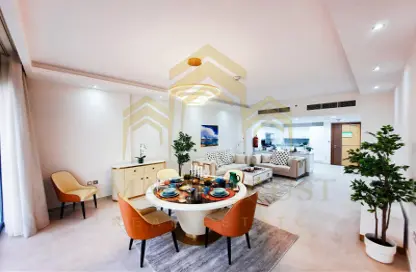 Living / Dining Room image for: Apartment - 1 Bedroom - 2 Bathrooms for sale in Burj Al Marina - Marina District - Lusail, Image 1