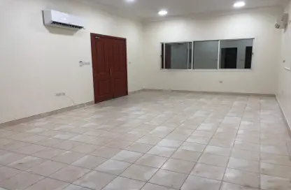 Empty Room image for: Villa - 6 Bedrooms - 7 Bathrooms for rent in Ain Khaled - Ain Khaled - Doha, Image 1