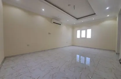 Empty Room image for: Compound - 7 Bedrooms - 5 Bathrooms for rent in Souk Al gharaffa - Al Gharrafa - Doha, Image 1