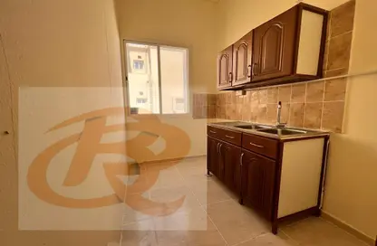 صورة لـ مطبخ شقة - غرفة نوم - 1 حمام للايجار في العزيزية - الدوحة ، صورة رقم 1