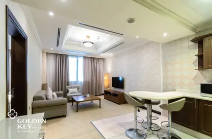 Living / Dining Room image for: Apartment - 1 Bedroom - 2 Bathrooms for rent in Al Sadd - Al Sadd - Doha, Image 1
