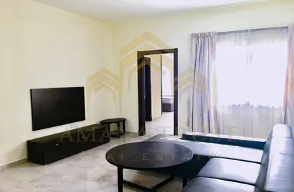 صورة لـ غرفة المعيشة مجمع سكني - 3 غرف نوم - 3 حمامات للايجار في الوعب - الوعب - الدوحة ، صورة رقم 1