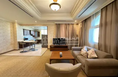 Living Room image for: Apartment - 1 Bedroom - 2 Bathrooms for rent in T Block - Al Manara Street - Al Sadd - Doha, Image 1