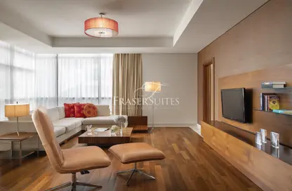 Living Room image for: Hotel Apartments - 1 Bedroom - 2 Bathrooms for rent in Fraser Suites - Corniche Road - Doha, Image 1