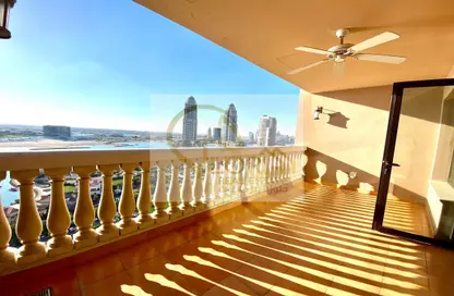 صورة لـ شرفة شقة - 3 غرف نوم - 4 حمامات للايجار في طريق بورتو الشرقي - بورتو أرابيا - جزيرة اللؤلؤة - الدوحة ، صورة رقم 1