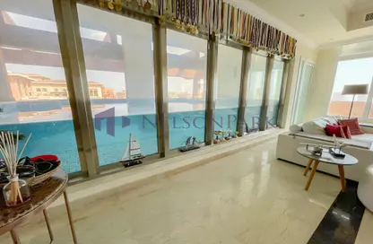 صورة لـ غرفة المعيشة شقة - 4 غرف نوم - 6 حمامات للبيع في بوابة المارينا - بورتو أرابيا - جزيرة اللؤلؤة - الدوحة ، صورة رقم 1