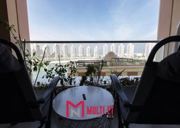 صورةشرفة لـ: شقة - 1 غرفة نوم - 2 حمامات للبيع في فيفا غرب - فيفا بحرية - جزيرة اللؤلؤة - الدوحة, صورة 1