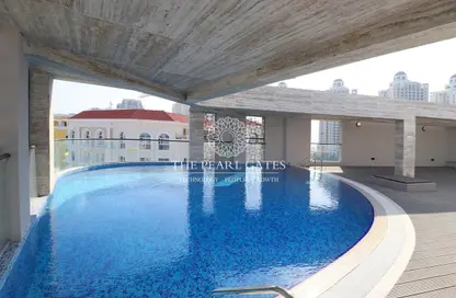 صورة لـ حوض سباحة شقة - 2 غرف نوم - 3 حمامات للايجار في جياردينو فيلدج - جزيرة اللؤلؤة - الدوحة ، صورة رقم 1