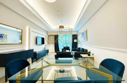 Living / Dining Room image for: Apartment - 1 Bedroom - 2 Bathrooms for sale in Al Sadd Road - Al Sadd - Doha, Image 1