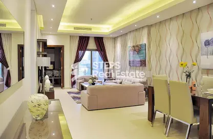 Living / Dining Room image for: Apartment - 2 Bedrooms - 3 Bathrooms for rent in Al Aman Street - Umm Ghuwailina - Doha, Image 1