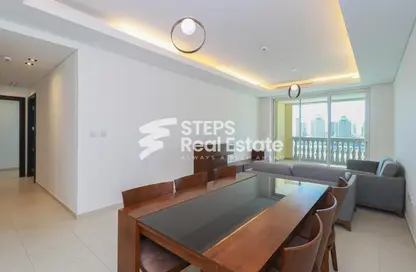 Living / Dining Room image for: Apartment - 2 Bedrooms - 3 Bathrooms for rent in Viva West - Viva Bahriyah - The Pearl Island - Doha, Image 1