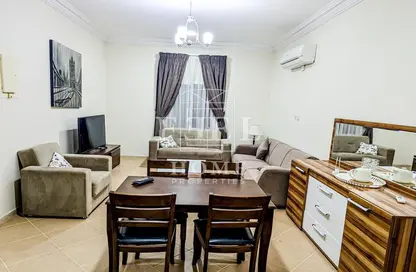 Living / Dining Room image for: Apartment - 2 Bedrooms - 2 Bathrooms for rent in Al Muntazah Street - Al Muntazah - Doha, Image 1