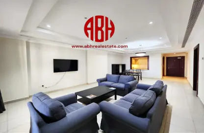 Living Room image for: Apartment - 2 Bedrooms - 3 Bathrooms for sale in East Porto Drive - Porto Arabia - The Pearl Island - Doha, Image 1