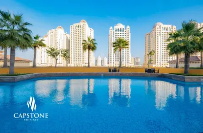 صورة لـ حوض سباحة شقة - غرفة نوم - 1 حمام للايجار في مدينة سنترال - سنتر المدينة - جزيرة اللؤلؤة - الدوحة ، صورة رقم 1