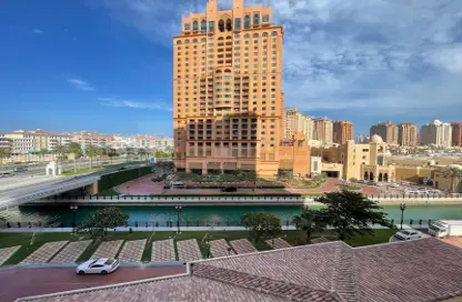 Outdoor Building image for: Apartment - 2 Bedrooms - 3 Bathrooms for rent in Piazza Arabia - Porto Arabia - The Pearl Island - Doha, Image 1