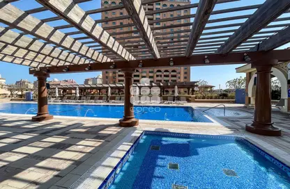 Pool image for: Apartment - 1 Bedroom - 1 Bathroom for rent in Burj Eleganté - Porto Arabia - The Pearl Island - Doha, Image 1