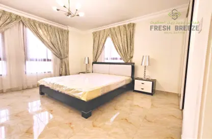 Room / Bedroom image for: Apartment - 1 Bedroom - 1 Bathroom for rent in Mughalina - Doha, Image 1