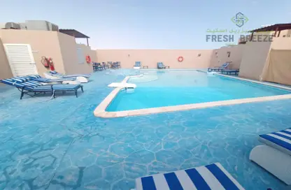 صورة لـ حوض سباحة شقة - غرفة نوم - 1 حمام للايجار في مشيرب - الدوحة ، صورة رقم 1