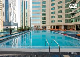 Pool image for: Apartment - 3 bedrooms - 3 bathrooms for rent in Beverly Hills Tower - West Bay - West Bay - Doha, Image 1