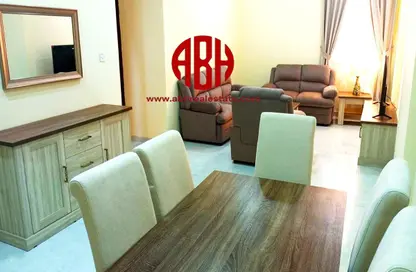 Living / Dining Room image for: Apartment - 2 Bedrooms - 2 Bathrooms for rent in Al Jassim Tower - C-Ring Road - Al Sadd - Doha, Image 1
