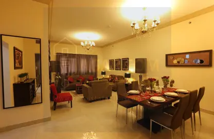 Living / Dining Room image for: Apartment - 2 Bedrooms - 3 Bathrooms for rent in Al Sadd Road - Al Sadd - Doha, Image 1