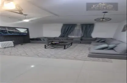 صورة لـ غرفة المعيشة شقة - 3 غرف نوم - 2 حمامات للايجار في مجمع الشافي - الريان - الدوحة ، صورة رقم 1