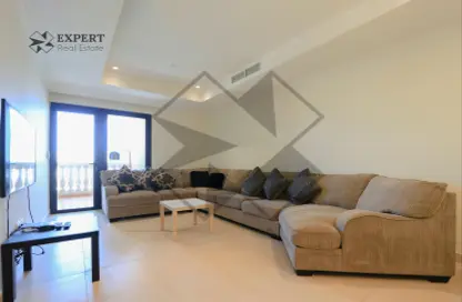 Living Room image for: Apartment - 1 Bedroom - 1 Bathroom for sale in East Porto Drive - Porto Arabia - The Pearl Island - Doha, Image 1