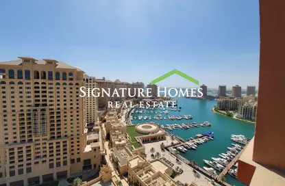 Apartment - 2 Bedrooms - 2 Bathrooms for rent in Tower 21 - Porto Arabia - The Pearl Island - Doha