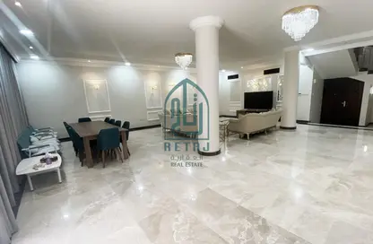 Living / Dining Room image for: Compound - 6 Bedrooms for rent in West Bay Lagoon Street - West Bay Lagoon - Doha, Image 1