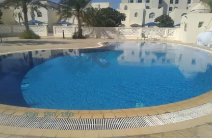 Pool image for: Villa - 4 Bedrooms - 5 Bathrooms for rent in Wadi Al Shaheeniya Street - Ain Khaled - Doha, Image 1