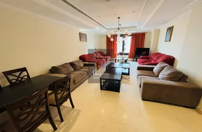 Living / Dining Room image for: Apartment - 2 Bedrooms - 3 Bathrooms for rent in Tower 19 - Porto Arabia - The Pearl Island - Doha, Image 1