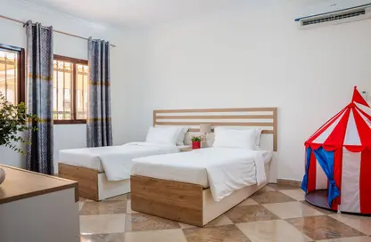 Apartment - 2 Bedrooms - 2 Bathrooms for rent in Ezdan Village 2 - Al Duhail - Doha