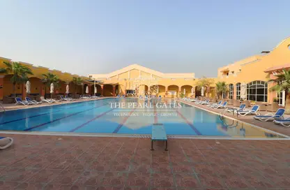 Pool image for: Villa - 4 Bedrooms - 5 Bathrooms for rent in Abu Sidra - Al Rayyan - Doha, Image 1