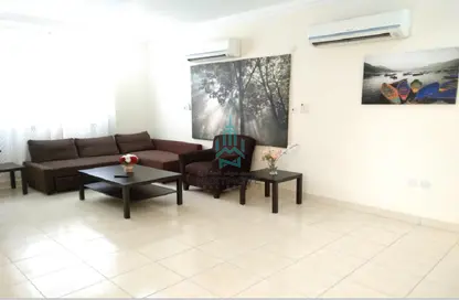Living Room image for: Compound - 6 Bedrooms - 6 Bathrooms for rent in Bu Hamour Street - Abu Hamour - Doha, Image 1