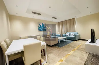صورة لـ غرفة المعيشة / غرفة الطعام شقة - 3 غرف نوم - 4 حمامات للايجار في جياردينو فيلدج - جزيرة اللؤلؤة - الدوحة ، صورة رقم 1