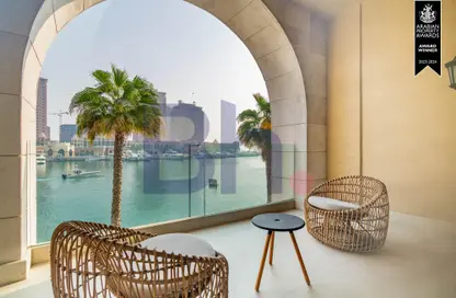 Pool image for: Townhouse - 1 Bedroom - 2 Bathrooms for rent in The St. Regis Marsa Arabia Island - Marsa Arabia - The Pearl Island - Doha, Image 1