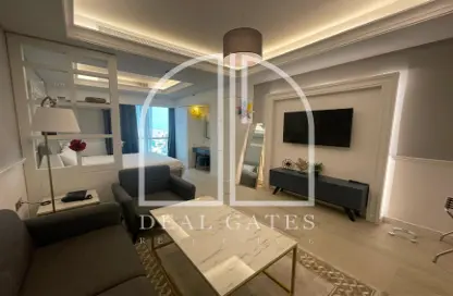 Living Room image for: Apartment - 1 Bathroom for rent in Al Sadd Road - Al Sadd - Doha, Image 1