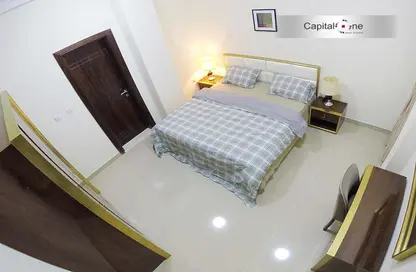 صورة لـ غرفة- غرفة النوم شقة - 2 غرف نوم - 2 حمامات للايجار في بناية كابيتال وان - نجمة - الدوحة ، صورة رقم 1