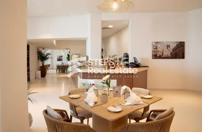 Living / Dining Room image for: Apartment - 1 Bedroom - 2 Bathrooms for rent in Regency Business Center 2 - Regency Business Center 2 - Corniche Road - Doha, Image 1