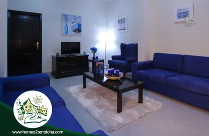 Living Room image for: Apartment - 1 Bedroom - 1 Bathroom for rent in Al Hamraa Street - Al Thumama - Doha, Image 1