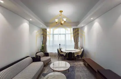 Living / Dining Room image for: Apartment - 2 Bedrooms - 3 Bathrooms for sale in Burj Al Marina - Marina District - Lusail, Image 1