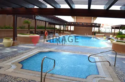 صورة لـ حوض سباحة شقة - 2 غرف نوم - 2 حمامات للايجار في بورتو أرابيا - جزيرة اللؤلؤة - الدوحة ، صورة رقم 1