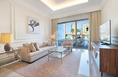 Living Room image for: Duplex - 4 Bedrooms - 5 Bathrooms for rent in The St. Regis Marsa Arabia Island - Marsa Arabia - The Pearl Island - Doha, Image 1