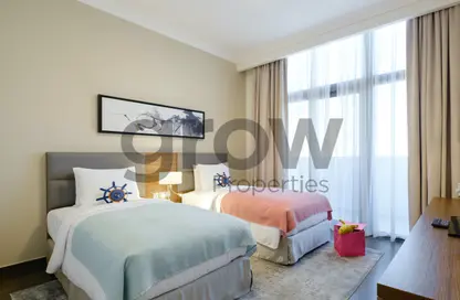 صورة لـ غرفة- غرفة النوم شقة - 2 غرف نوم - 4 حمامات للايجار في لو ميراج سيتي ووك - فريج بن محمود- جنوب - فريج بن محمود - الدوحة ، صورة رقم 1