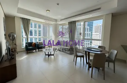 Living / Dining Room image for: Apartment - 1 Bedroom - 2 Bathrooms for rent in Burj DAMAC Marina - Lusail, Image 1