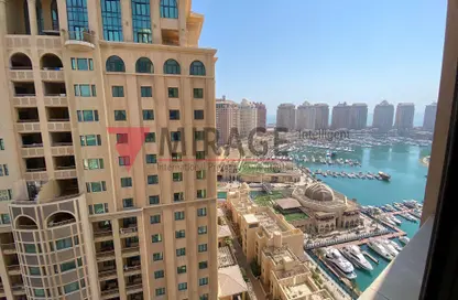 Outdoor Building image for: Apartment - 1 Bedroom - 2 Bathrooms for rent in Tower 14 - Porto Arabia - The Pearl Island - Doha, Image 1